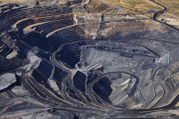A photograph of an open pit mine