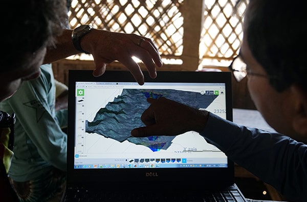  Above: Alastair McClymont identifying possible drilling targets in Nayapara with the International Organization for Migration (IOM) water sanitation and hygiene (WASH) officer for the Leda Refugee Camp. 