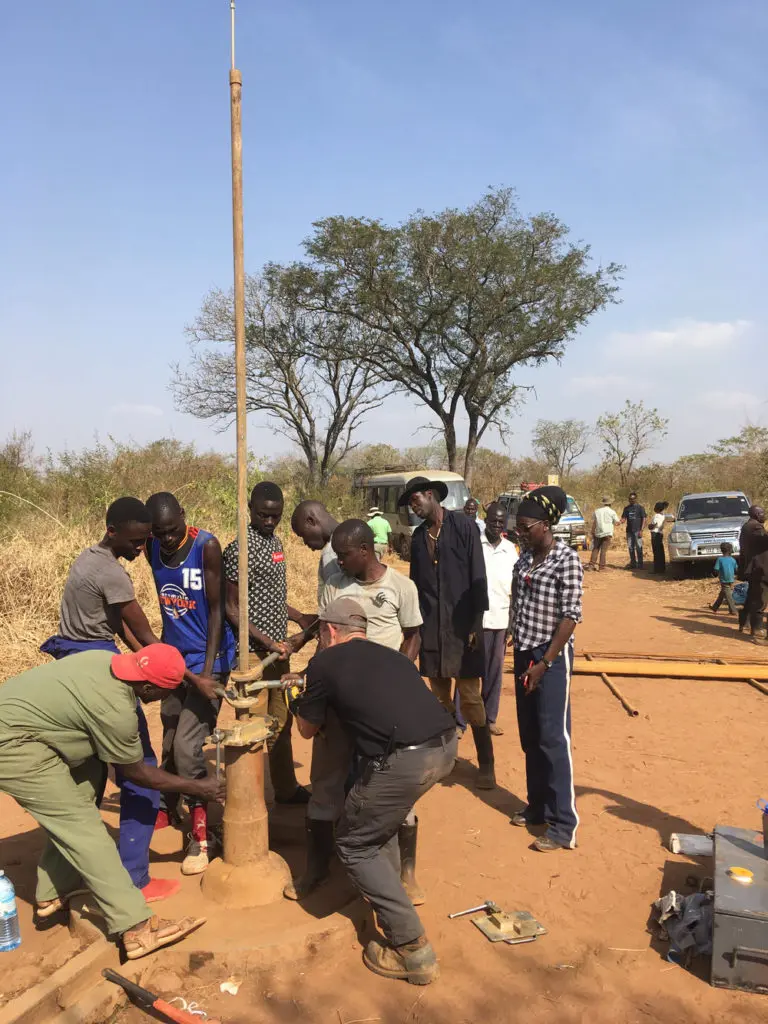  Completing a well repair with the students 