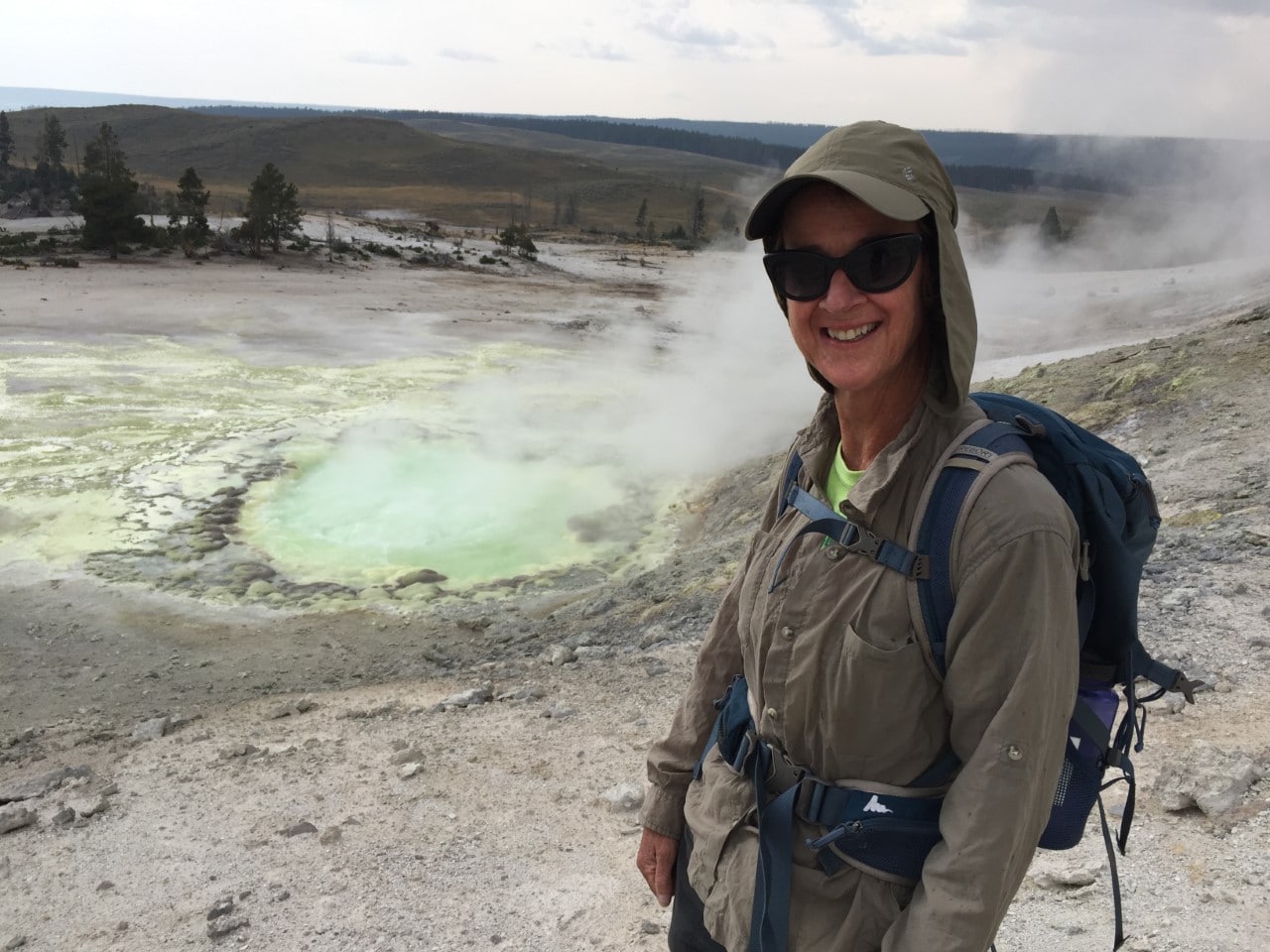 Carol Finn Geophysicist at Sulphur Spring in Yellowstone