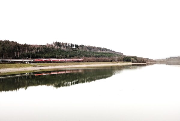 A train runs along the tracks between the cities of Gelnhausen and Fulda, northeast of Frankfurt, in Germany.