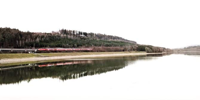 A train runs along the trackes near the