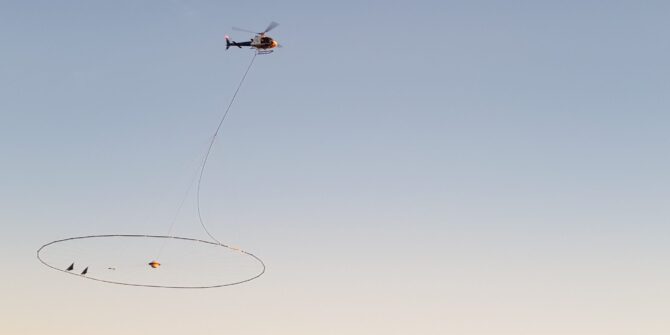 A picture of a helicopter TEM EM Geophysics survey