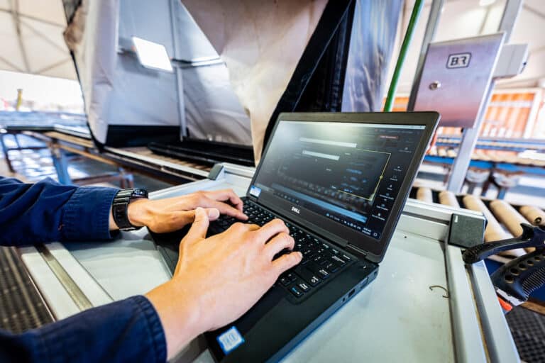 A photo showing the hands of an exploration geologist using Seequent's image capture and storage technology Imago.