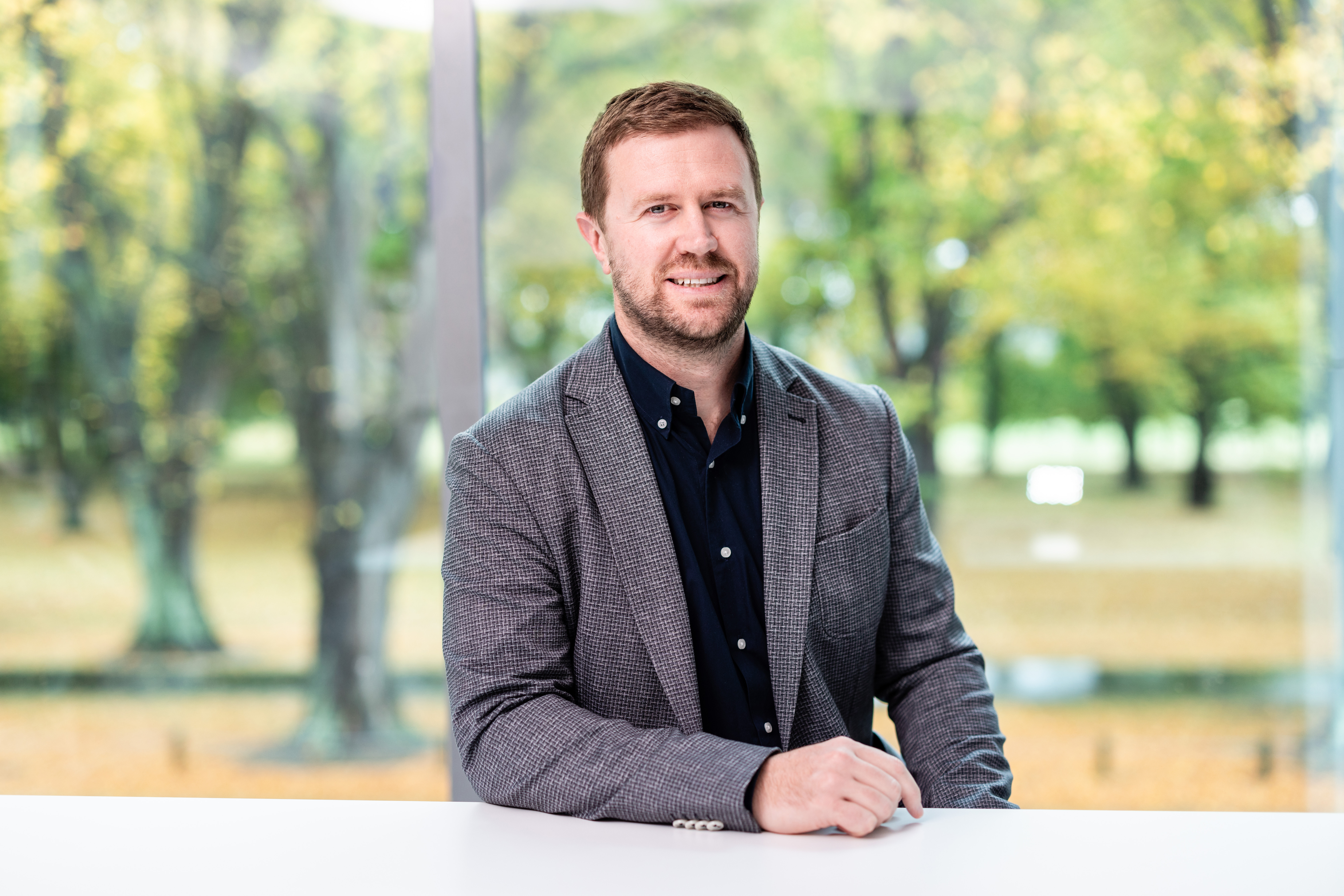 Seequent Segment Director for Energy, Jeremy O'Brien, sits at the Christchurch office.