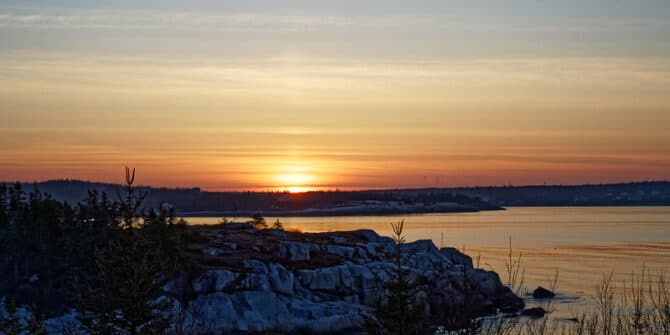 A photograph of the Canadian coast of Nova Scotia during sunset