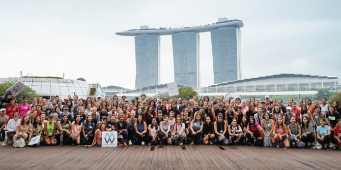 A photograph of a group of about 100 women attending Mentor Walks in Singapore