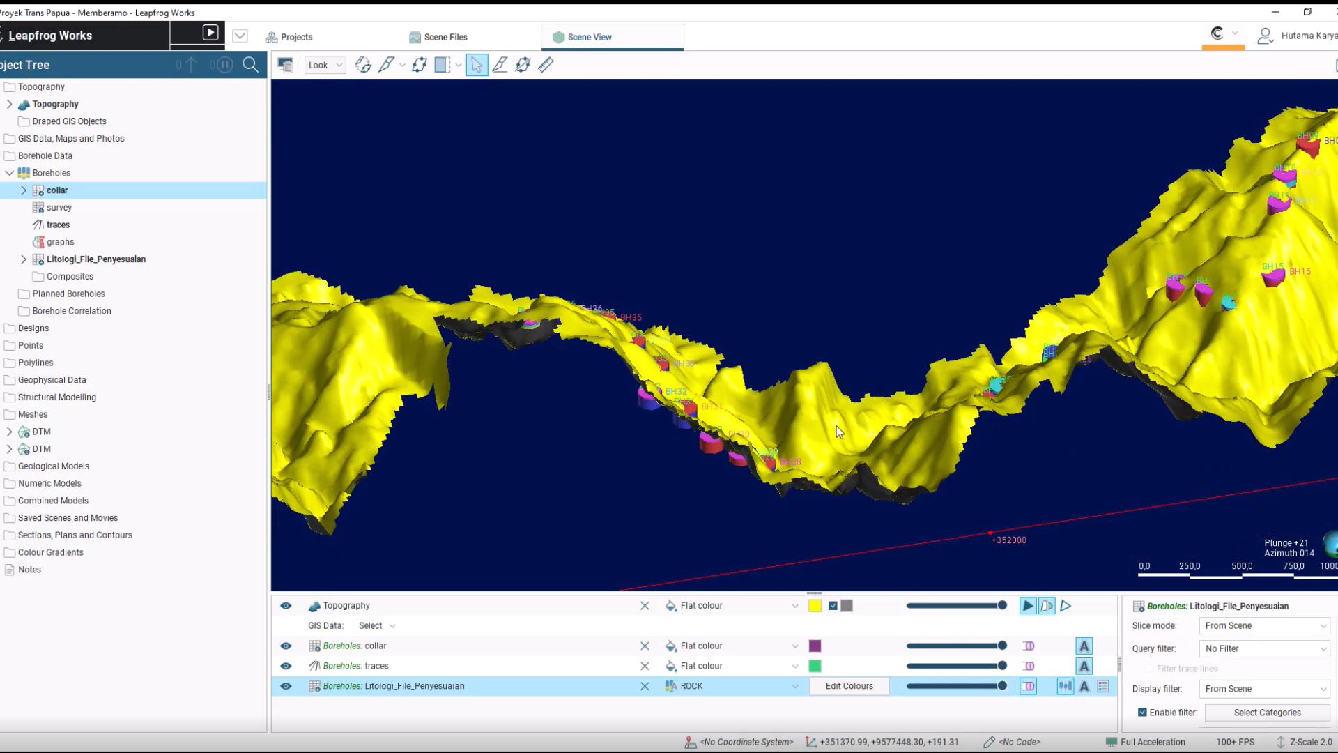 A Leapfrog Works 3D modelling interface showing a bright yellow geological surface model set against a dark blue background. Several coloured cylindrical markers appear along the model, representing boreholes or data points. The left sidebar displays project layers and data options, while toolbars and settings are visible along the top and bottom of the screen.